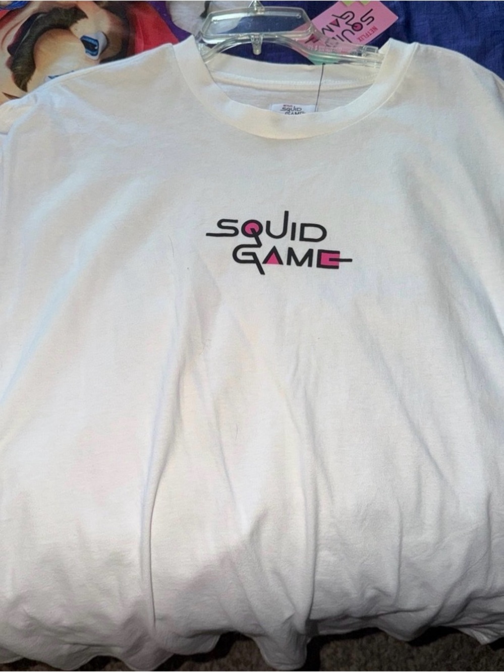 Netflix White T-Shirt with Black and Pink Squid Game Logo